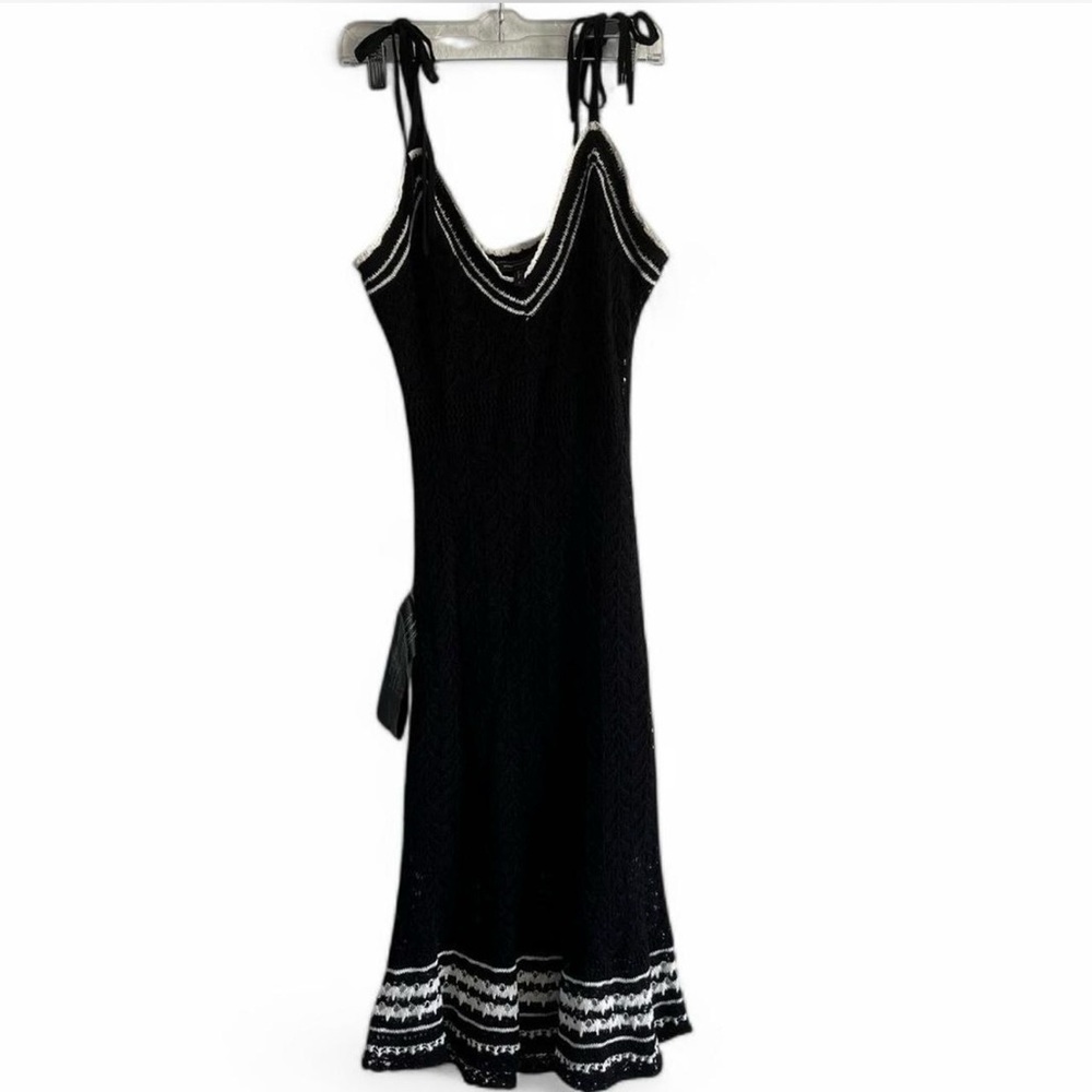BCBG Black and white knit dress with tie strap detail.